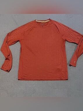 Smartwool merino 150 l/s base layer mens medium NWOT with a small pin hole